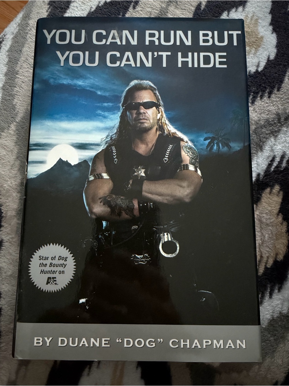 You Can Run But You Can't Hide by Duane "Dog" Chapman - Black & Blue Cover